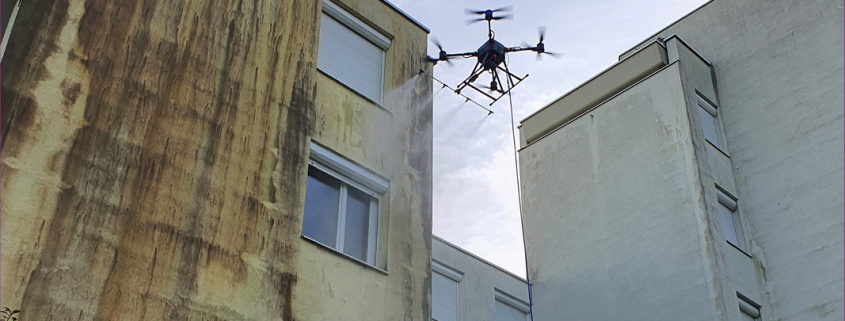 pulvérisation démoussage par drone sur façade