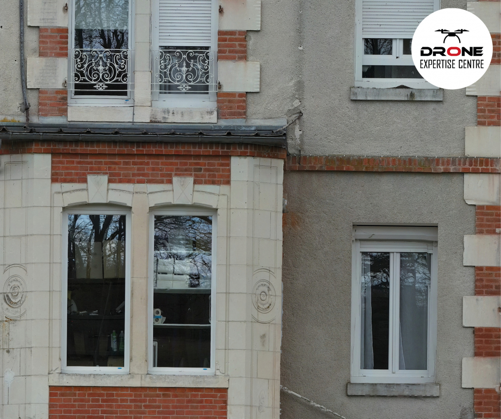 Orthofaçade par drone d’un immeuble avec prise de mesures précises en façade