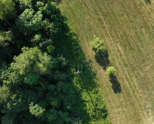 Numérisation HTA et BT par LiDAR drone en Lorraine pour l'analyse des emprises terrain Numérisation HTA et BT par LiDAR drone en Lorraine au-dessus d'espaces agricoles et forestiers
