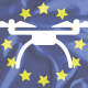 Illustration du cadre européen de la réglementation drone 2026 avec un drone représenté devant le drapeau de l’Union européenne